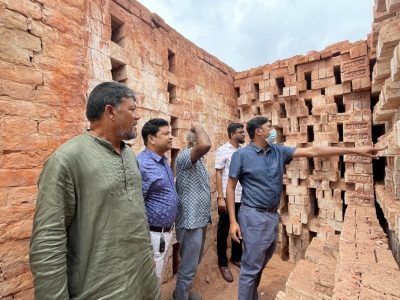Folks assessing bricks in Bangladesh