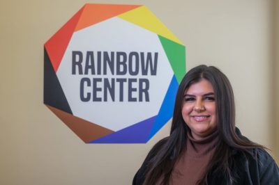 Bri Vig with Rainbow Center logo