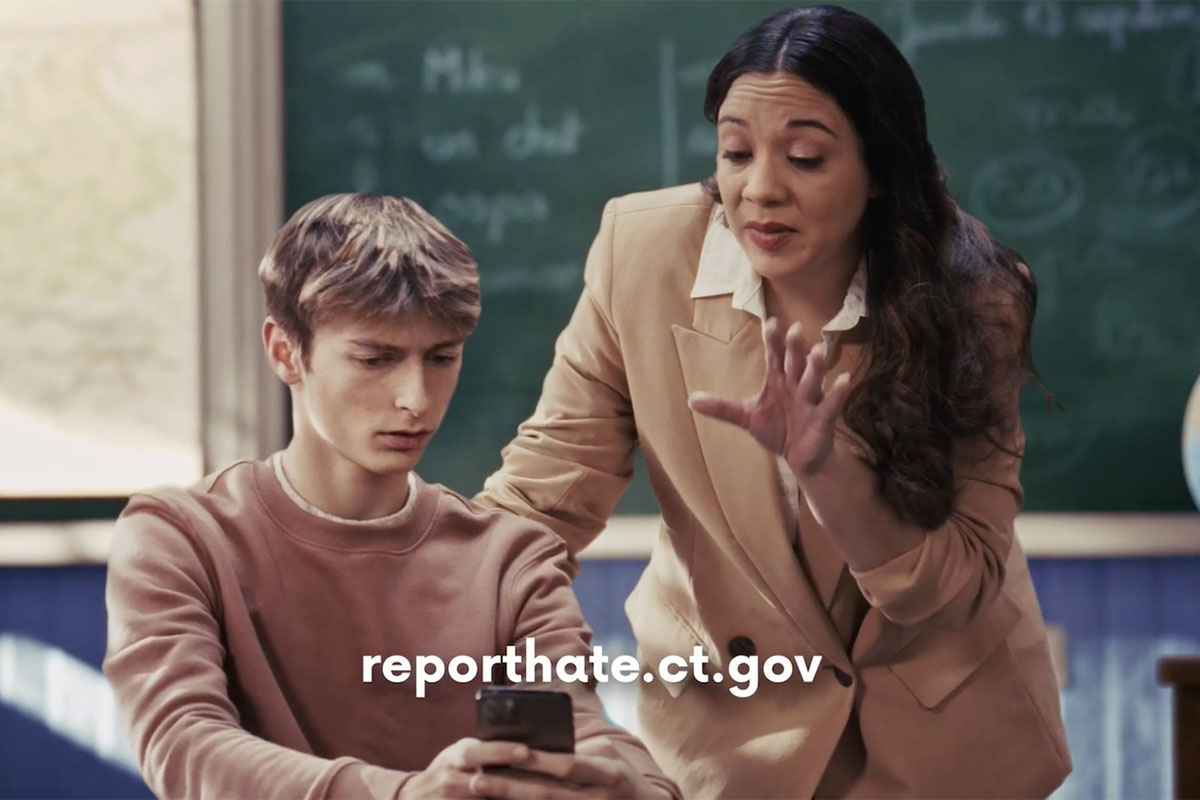 Screen shot from a public service announcement promoting reporthate.ct.gov.